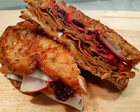 No Squeal All Appeal Country Hammm Grilled Cheeze Sandwich with Black Berry and Jalapeno Compote and thinly sliced pear.